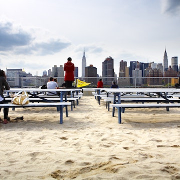 Sandy setting at Water Taxi Beach bar opposite Manhattan, Queens.