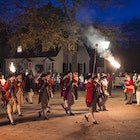 WILLIAMSBURG VA - DECEMBER 6:  Scenes from the night torch light parade with the fife and drum corps as part of the Holiday decorations and celebration in Colonial Williamsburg VA on December 6, 2017 . (Photo by John McDonnell/The Washington Post via Getty Images)