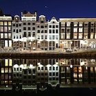 AMSTERDAM, NETHERLANDS - APRIL 04:  A general view of houses near the "Red Light District" which comes from the red neon lights that highlight the windows where prostitution is legal, but the area is also famous for its canals, coffeeshops selling marijuana or cannabis, brothels, sex shops and museums on what would be a usually busy Saturday night on April 04, 2020 in Amsterdam, Netherlands. All non-essential businesses will follow national policy regarding the coronavirus (COVID-19) due to precautionary measures and will be closed to the public at least until further notice.  The Coronavirus (COVID-19) pandemic has spread to many countries across the world, claiming over 60,000 lives and infecting hundreds of thousands more. (Photo by Dean Mouhtaropoulos/Getty Images)
1217135211
bestof, topix