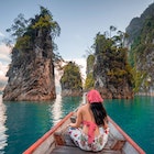 Asia Travel Thailand. Tourists in red bikini sets are holding hands with fun on the boat at Khao Sok National Park, Chiewlarn Dam, Thailand. Chiao Lan Khao Sok Dam is a tourist attraction in Surat Thani Province of Thailand.Happy woman traveler on boat her arms open feeling freedom, Ratchaprapa dam in KHAO SOK National Park, Thailand, Surat thani,Travel in Thailand, Beautiful destination Asia, Summer holiday outdoors vacation trip
1273413451