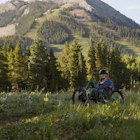 A disabled woman stops to see the beautiful view while riding a tri-bike path in the mountains of the Colorado Rockies as fog moves in the background from the valley below.
1360219293