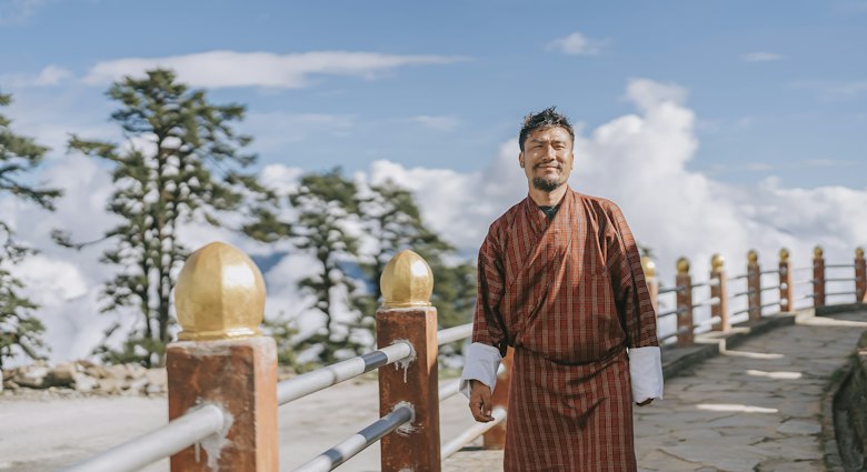 Portrait of Bhutanese man in traditional clothing at Dochula Pass
1434727198