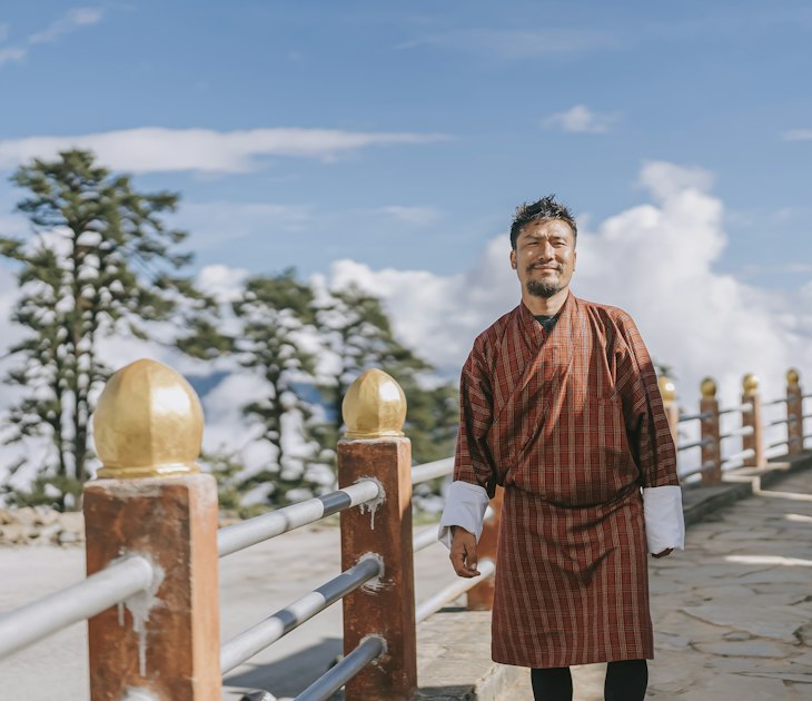 Portrait of Bhutanese man in traditional clothing at Dochula Pass
1434727198