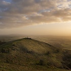 A fellow lone traveller with his faithful companion on Ragged Stone Hill looking out across the Severn Valley in the early morning light.  Bredon Hill and the Cotswolds visible in the distance across the valley.
1578830800
one man, united kingdom, ragged stone hill, welland, severn valley, early morning, light, clouds, lone walker, little dog, landscape, nikon, d7500, bredon hill, cotswolds.