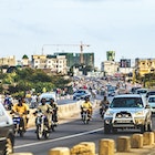 City traffic just before sunset.
521685405
African Descent, Developing Countries, Building Exterior, Large Group of Objects, Large Group Of People, Busy, City Life, Multi-Tasking, Roadside, Traffic Jam, Traffic, African Culture, Traditional Culture, Crowded, Travel Destinations, Transportation, Urban Scene, Outdoors, Crowd, People, Benin, West Africa, Africa, Day, Street, Road, Built Structure, City, Town, Pollution, Car, Motorcycle, Mode of Transport, Cotonou