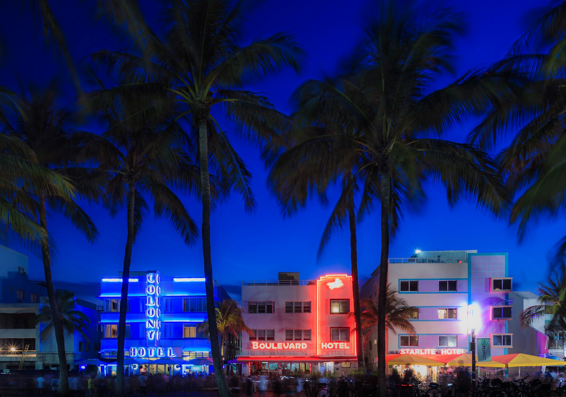 Illuminated hotels on Ocean Drive at South Beach, Miami Beach, Florida, USA