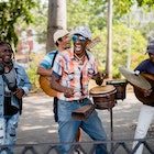 Happy cuban musicians playing live music on the street. They are smiling and playing different instruments as guitar and tambourine while they sing typical cuban songs. Photo from March, 2023.; Shutterstock ID 2298618495; full: 65050; gl: Online editorial; netsuite: Cuba best time to visit; your: Claire Naylor
2298618495