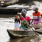 GANVIE, BENIN - JAN 11, 2017: Unidentified Beninese family in a wooden boat at the port of the lake Nokwe. Benin people suffer of poverty due to the bad economy.; Shutterstock ID 593573411; full: 65050; gl: Online Editorial; netsuite: Best places to visit in Benin; your: Jennifer Carey
593573411
A Beninese family in a wooden boat sailing across Lake Nokoue in Benin.