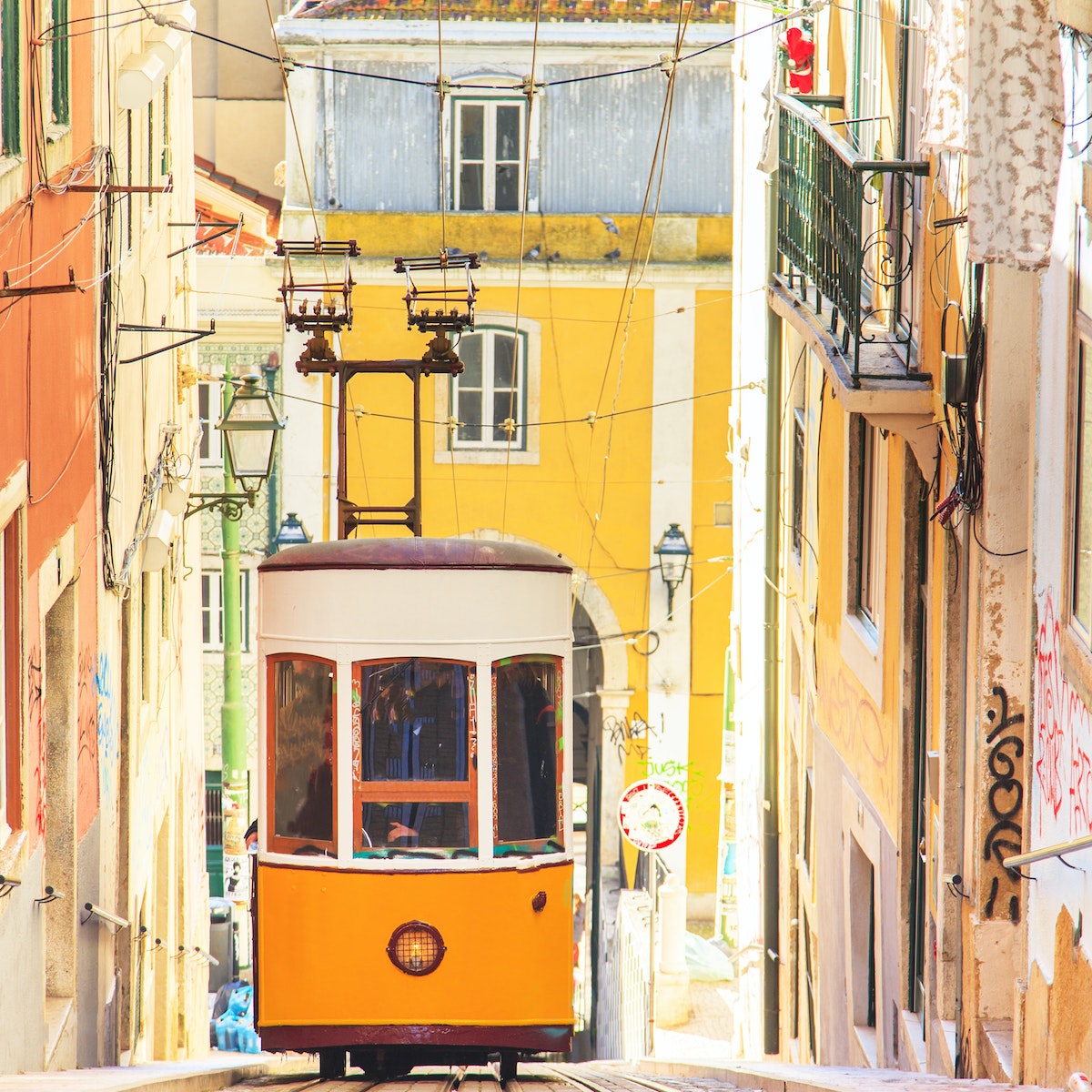 Lisbon's Gloria funicular classified in Bairro Alto in Lisbon, Portugal
244165612
downtown, uphill, street, electric, houses, national, european, central, urban, yellow, tramway, steep, history, streetcar, cable, lisbon, hills, rail, commute, train, portugal, gloria, funicular, elevator, historic, transport, center, architecture, city, colorful, public, railway, buildings, tram, connect, transportation, antique, track, car, vintage, tight, alley, monument, europe, cityscape, alfama, lisboa