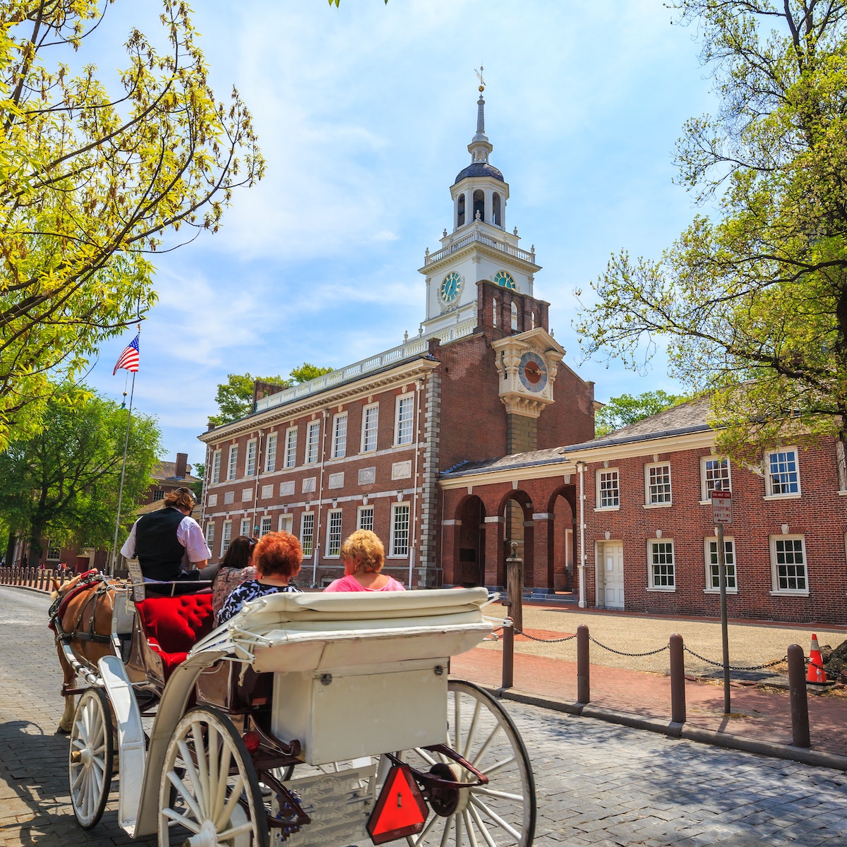 Independence Hall in Philadelphia, Pennsylvania.
276721013
america, usa, park, blue, travel, landmark, sky, pennsylvania, vintage, carriage, old, hall, philadelphia, building, american, historic, tower, national, united, states, independence, clock